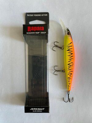 Воблер Rapala Shadow Rap Довжина 11 см Вага 13 грамів Джеркбейт повільно тонучий колір ЖОВТО-ПОМАРАНЧЕВИЙ