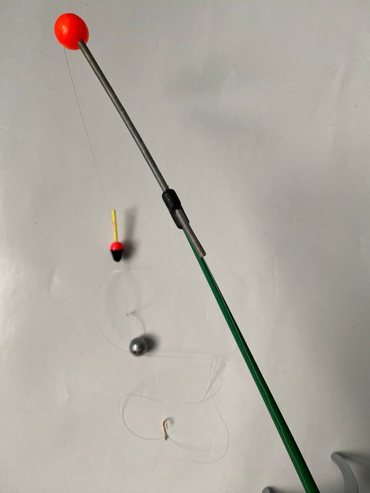 Rigged Ice Fishing Rod for Catching Peaceful Fish in Stagnant Water